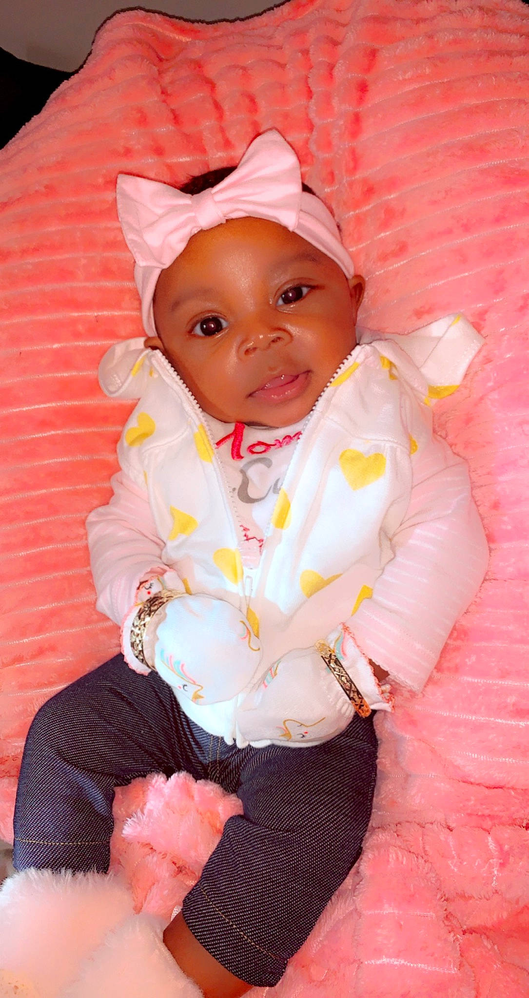 Noirë joined the competition — help win amazing prizes! baby, baby_products, baby_toddler_clothing, cap, cheek, child, doll, happy, headwear, human_body, iris, lip, nose, organ, person, pink, sitting, skin, sleeve, textile