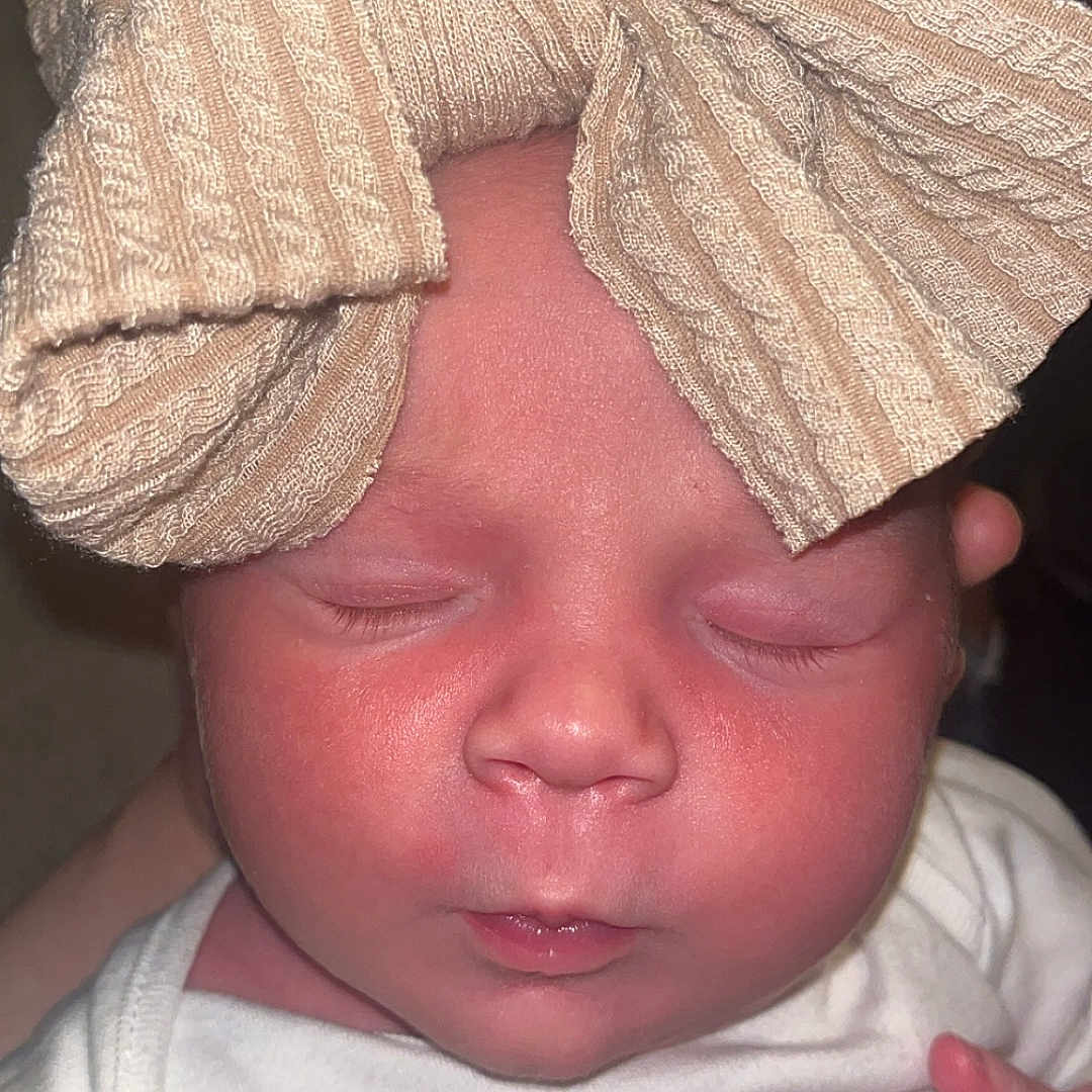 Aurora joined the competition — help win amazing prizes! baby, beanie, blanket, bodypart, bonnet, cap, clothing, face, finger, glove, hand, hat, head, newborn, person, photography, portrait, sleeping, towel, turban