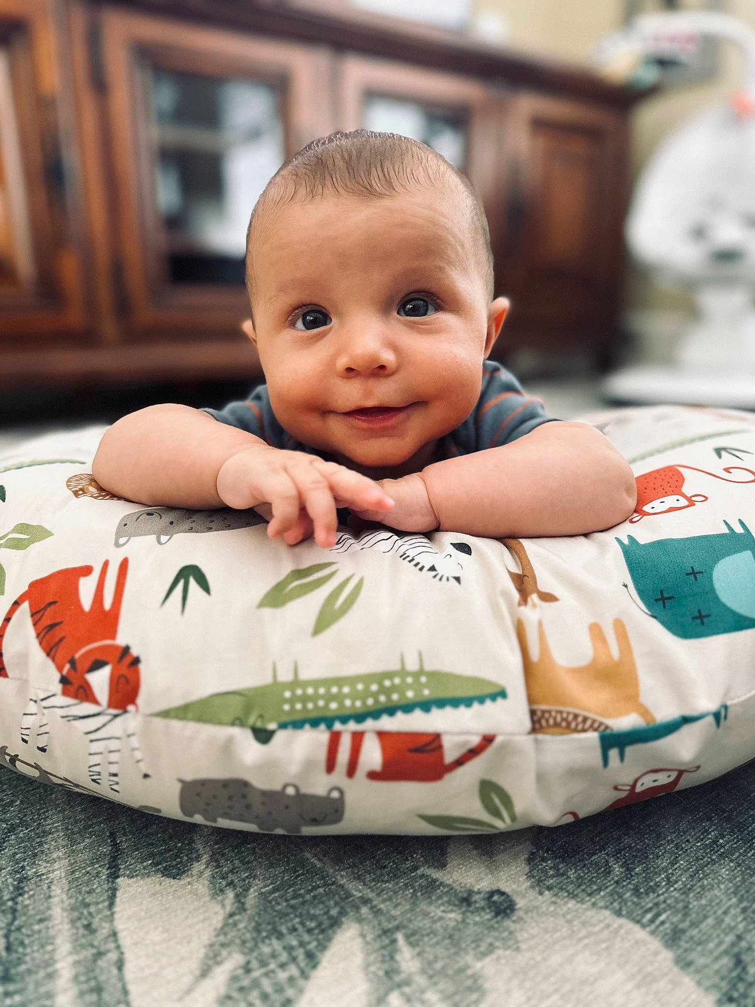 Kaleb joined the competition — help win amazing prizes! baby, baby_toddler_clothing, carmine, cheek, child, comfort, facial_expression, flooring, fun, grass, happy, head, human, leisure, linens, person, product, sitting, skin, smile