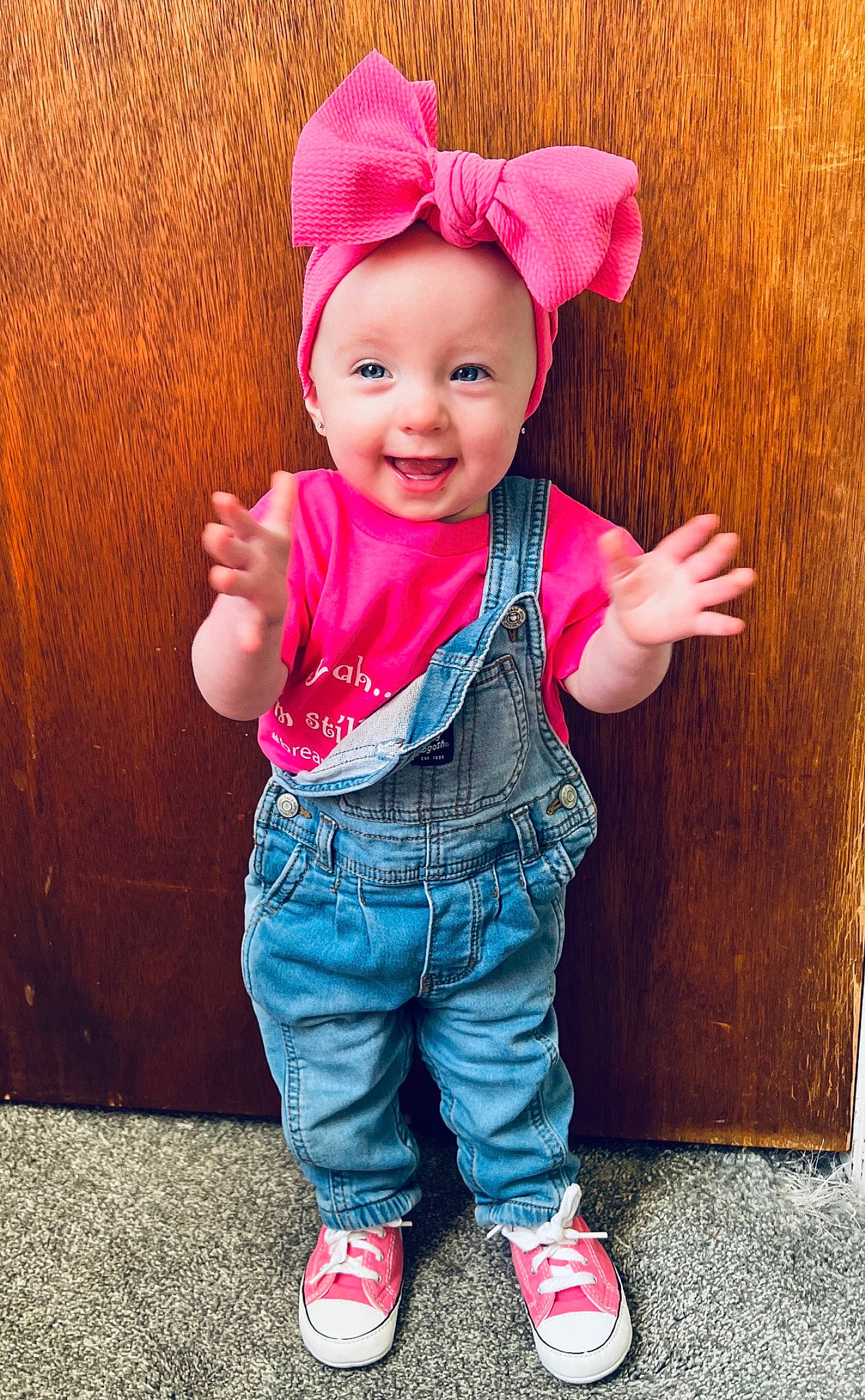 Anastasia joined the competition — help win amazing prizes! baby_toddler_clothing, cap, cheek, chin, clothing, eye, face, gesture, happy, head, headwear, lip, nose, outerwear, person, pink, shoe, skin, sleeve, smile