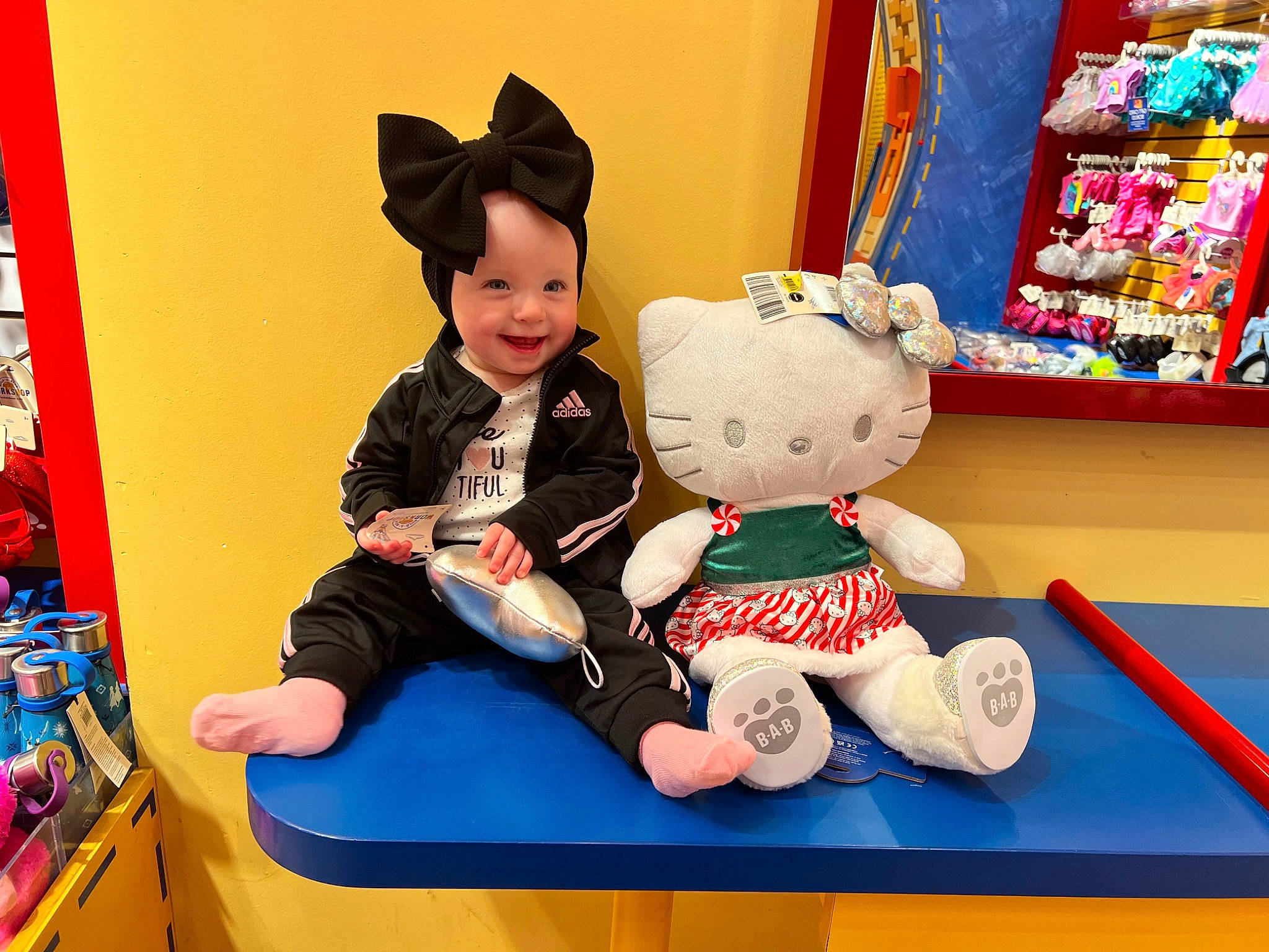 Anastasia is registered to the contest to win money with this photo: baby_toys, child, costume_hat, event, fun, happy, hat, headwear, joy, leisure, person, photograph, play, plush, recreation, room, sitting, smile, snapshot, stuffed_toy