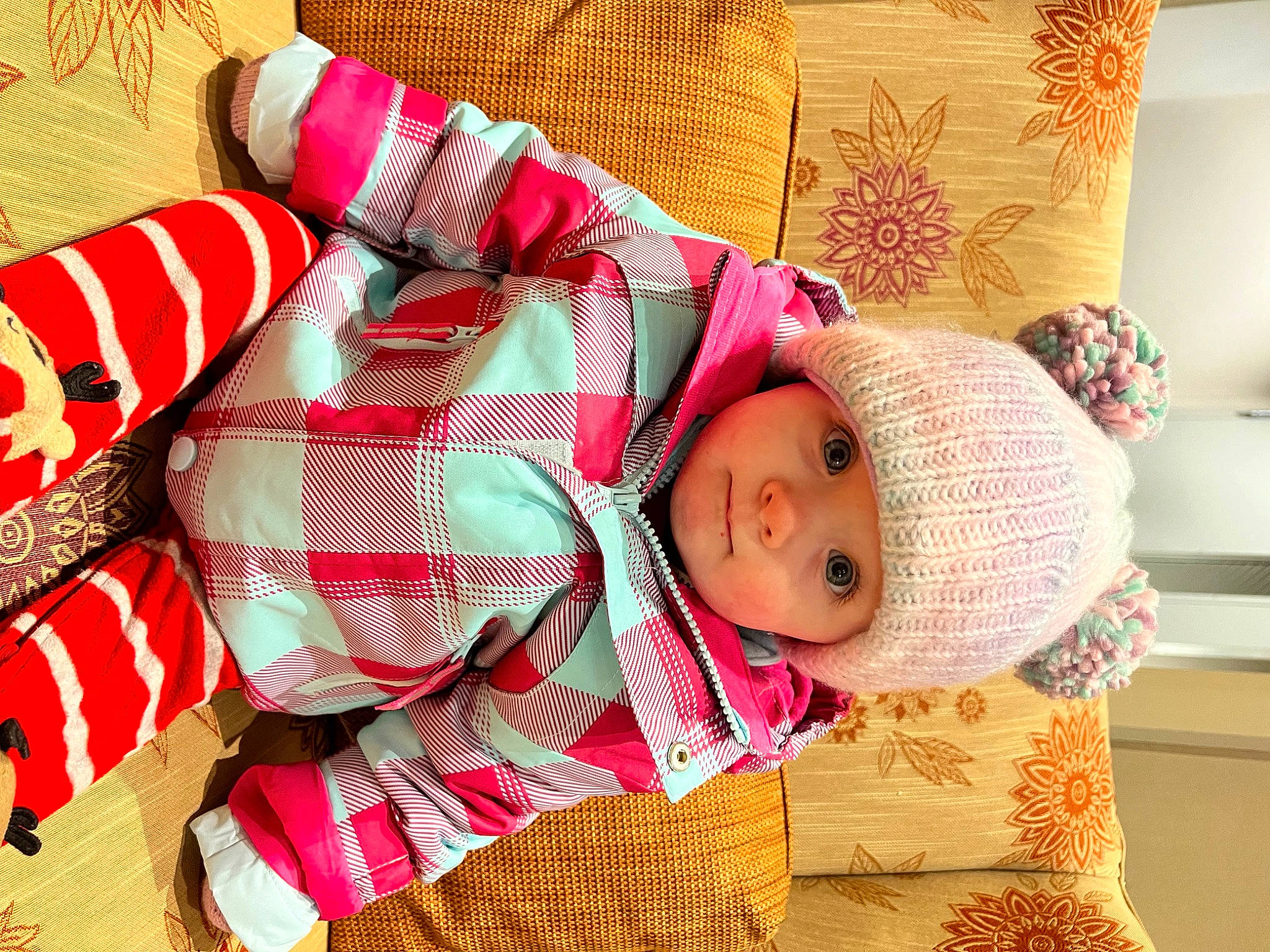 Anastasia is registered to the contest to win money with this photo: baby, baby_sleeping, baby_toddler_clothing, carmine, child, comfort, event, eye, fashion_accessory, happy, head, headwear, human_body, knit_cap, linens, pattern, person, plaid, sleeve, textile