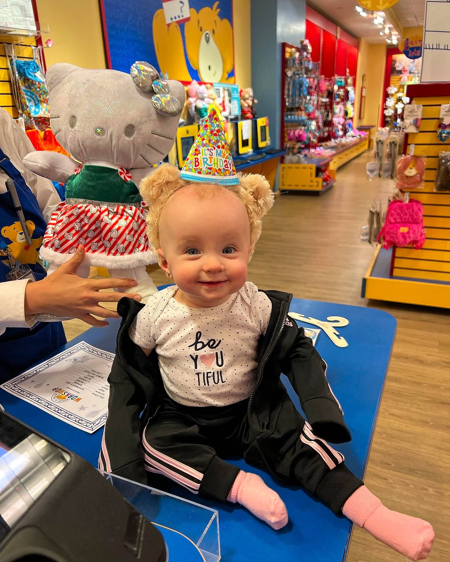 Anastasia is registered to the contest to win money with this photo: baby, blue, chair, child, event, flooring, fun, happy, joy, kindergarten, leisure, person, photograph, play, recreation, retail, room, sitting, smile, snapshot
