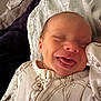 Riley-James joined the competition — help win amazing prizes! baby, infant, smiling, tongue_out, onesie, blanket, sleepwear, cute, face, head, newborn, child, cozy, soft, lying_down, happy, portrait, expression, indoors, person