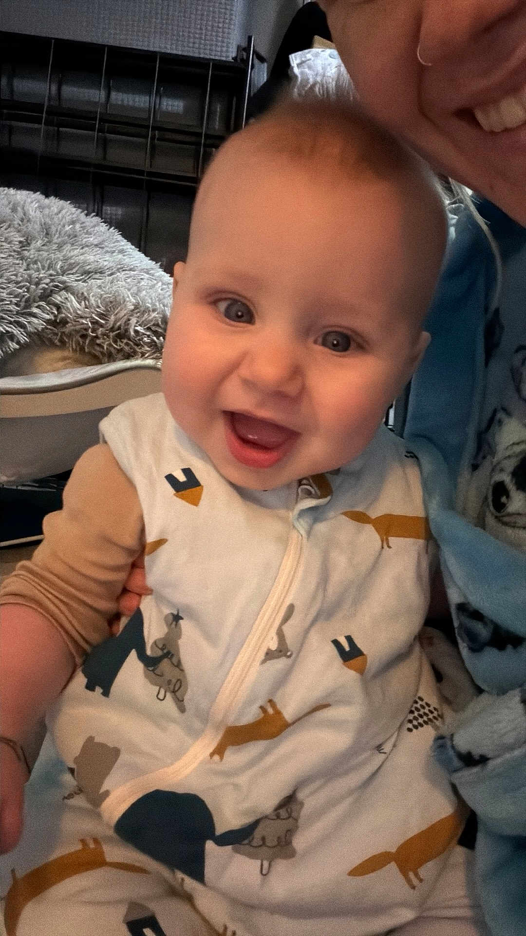 Riley-James joined the competition — help win amazing prizes! baby, smiling, child, onesie, animal_print, indoor, person, happy, face, closeup, childcare, infant, cute, apparel, portrait, family, warmth, toddler, cozy, expression