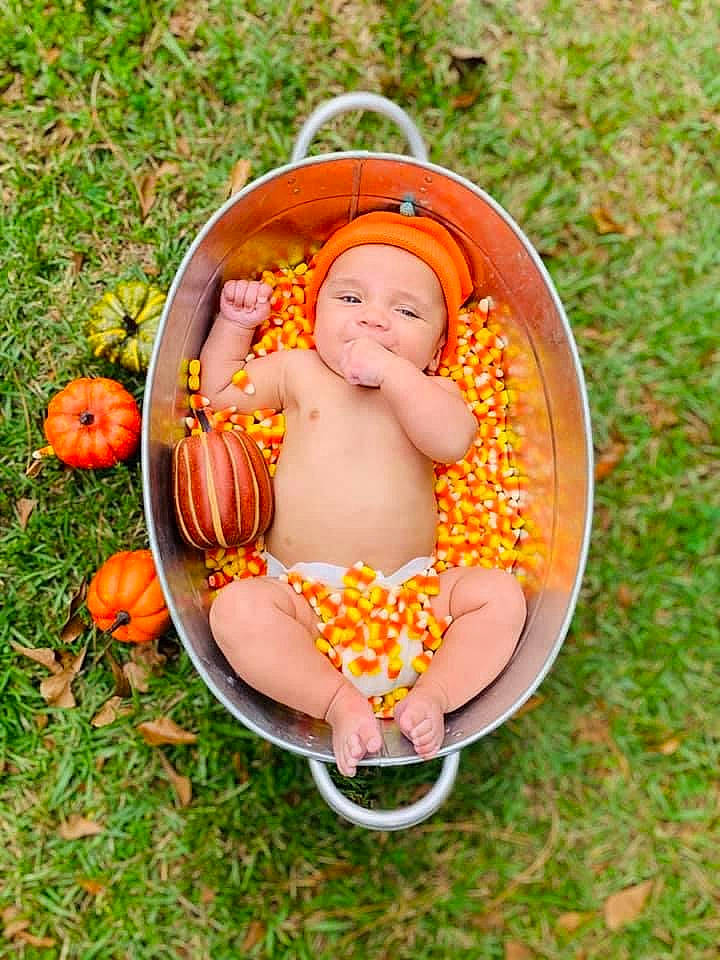 Maddix joined the competition — help win amazing prizes! baby, baby_products, baby_toddler_clothing, calabaza, cheek, child, cucurbita, gourd, headwear, human, natural_foods, nose, orange, peach, people_in_nature, person, pink, produce, pumpkin, squash