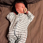 Kade joined the competition — help win amazing prizes! baby, bed, blanket, child, comfort, cozy, cute, googly_eyes, indoor, infant, laying_down, onesie, pacifier, patterned_clothing, plush_toy, resting, sleepwear, soft, spider, toy
