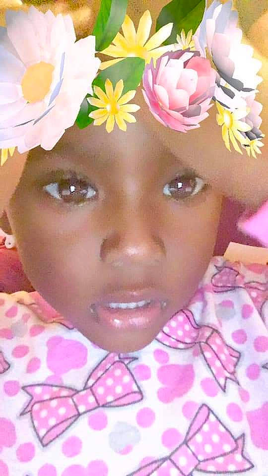 Diamond is registered to the contest to win money with this photo: cheek, child, face, fashion_accessory, forehead, hair_accessory, head, headgear, headwear, person, pink, toddler