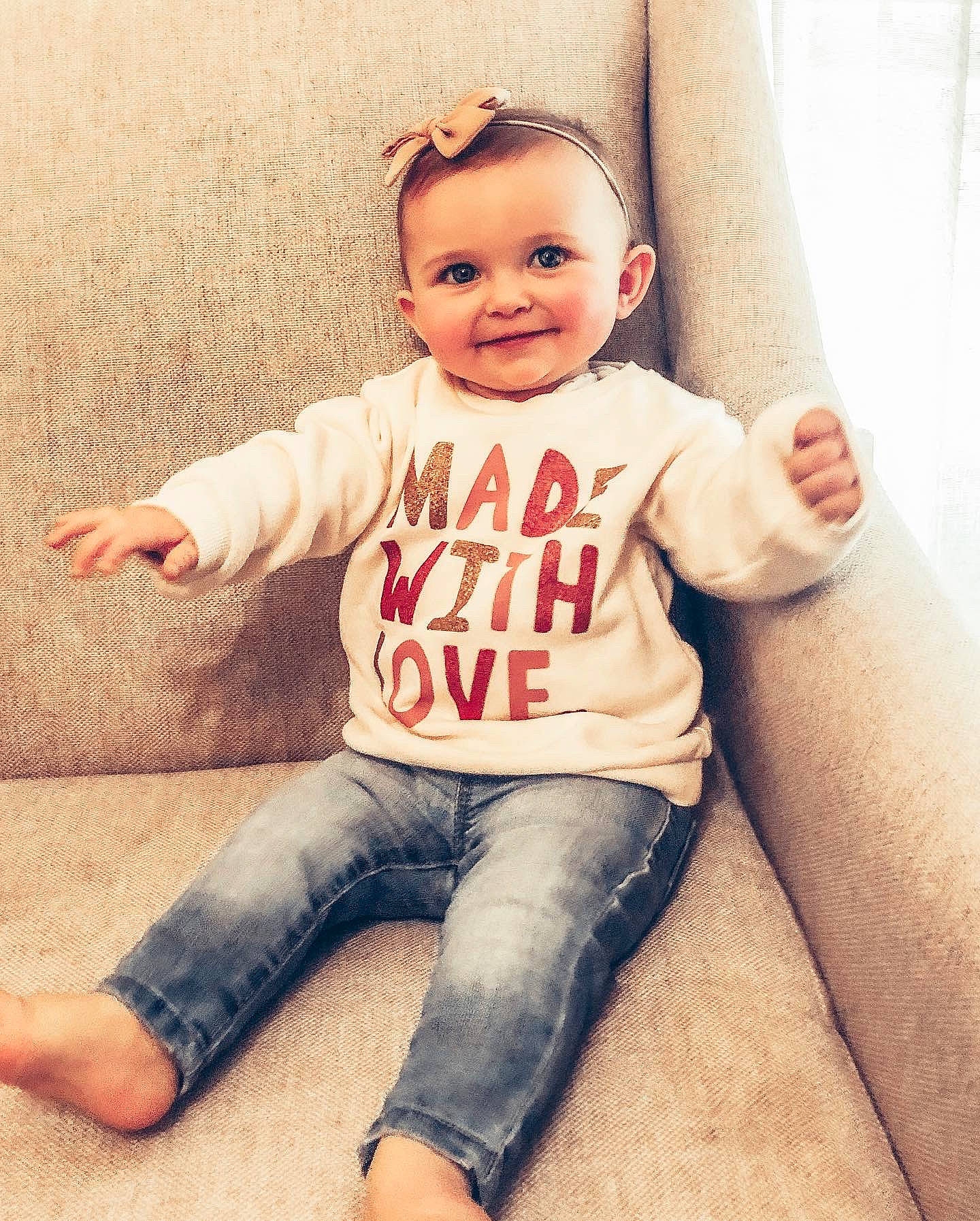 Roxie is registered to the contest to win money with this photo: baby, child, child_model, cool, denim, finger, fun, happy, jeans, joy, leg, people, person, photography, pink, sitting, skin, sleeve, smile, standing