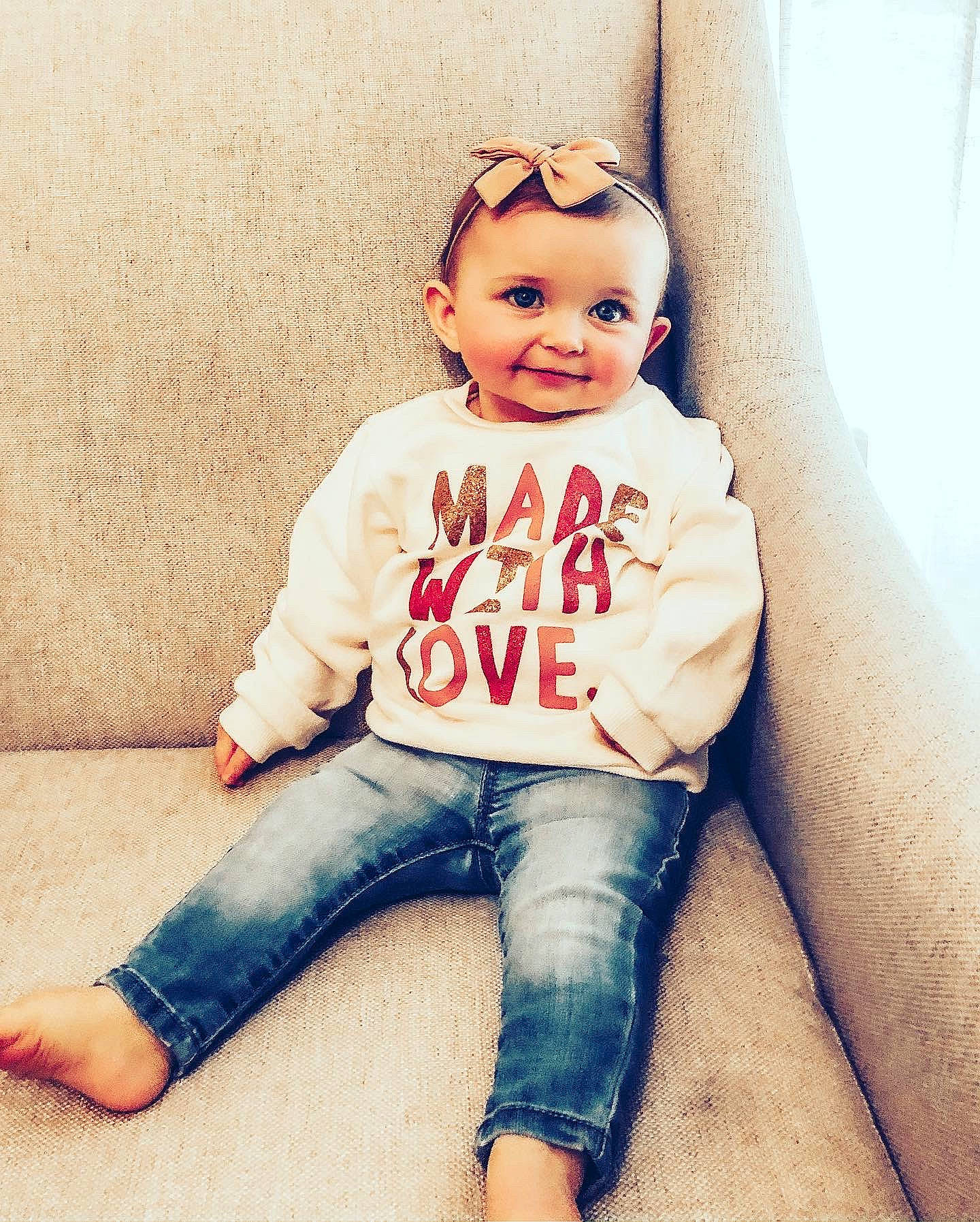 Roxie is registered to the contest to win money with this photo: baby, cheek, child, child_model, cool, denim, face, jeans, joy, leg, lip, outerwear, people, person, photography, pink, sitting, skin, sleeve, smile