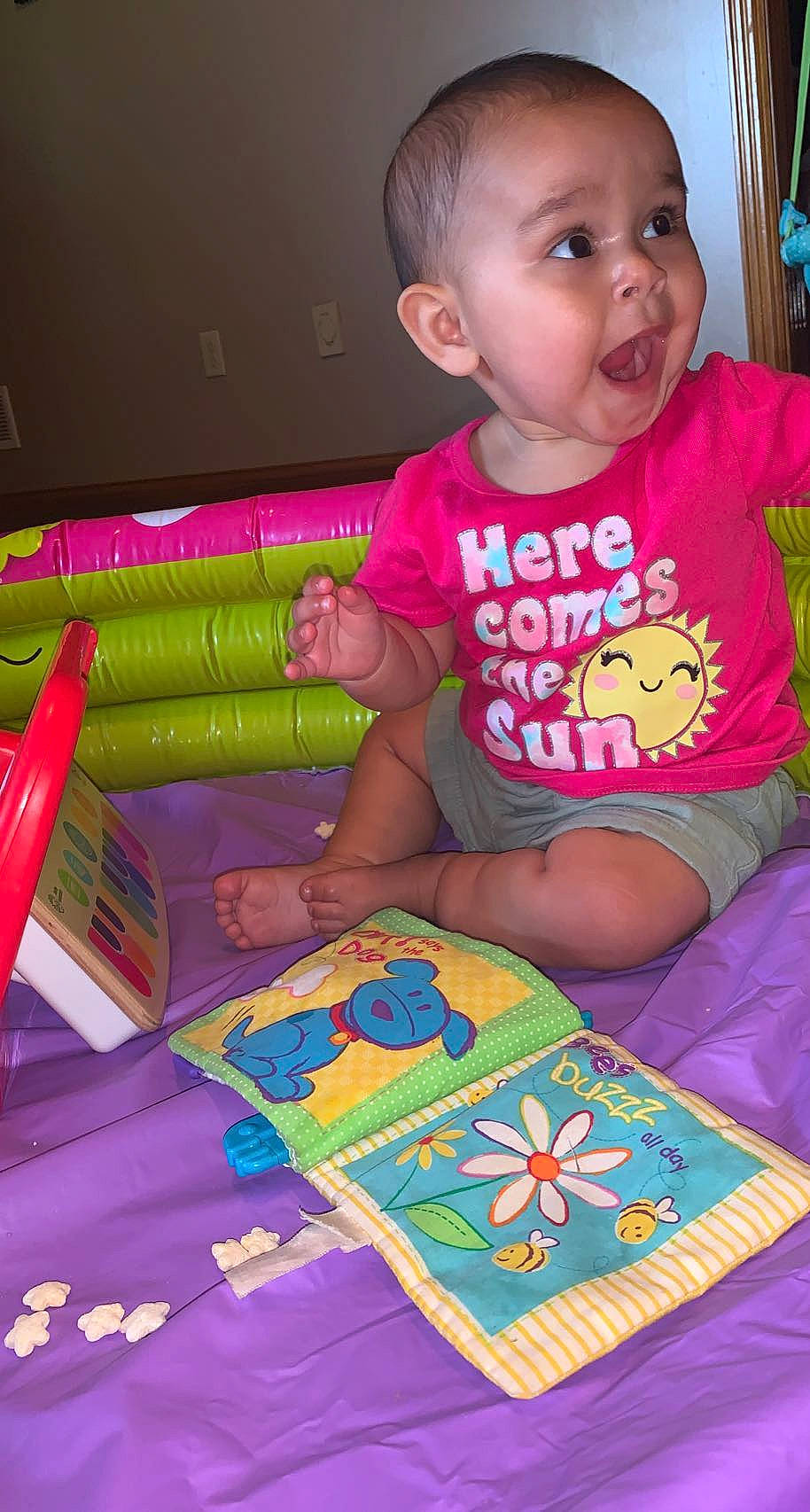 Lilah joined the competition — help win amazing prizes! art, baby, baby_playing_with_toys, baby_toddler_clothing, beauty, cheek, child, fun, green, linens, magenta, pattern, person, pink, play, product, red, sitting, surprise, t_shirt