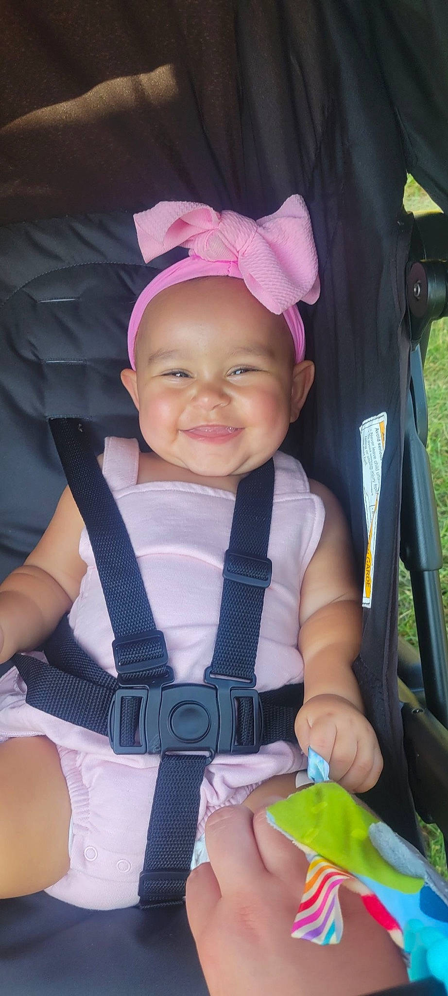 Lilah joined the competition — help win amazing prizes! baby, baby_carriage, baby_products, baby_toddler_clothing, chair, child, electric_blue, fun, green, happy, headwear, joy, magenta, person, photograph, pink, product, purple, sitting, skin