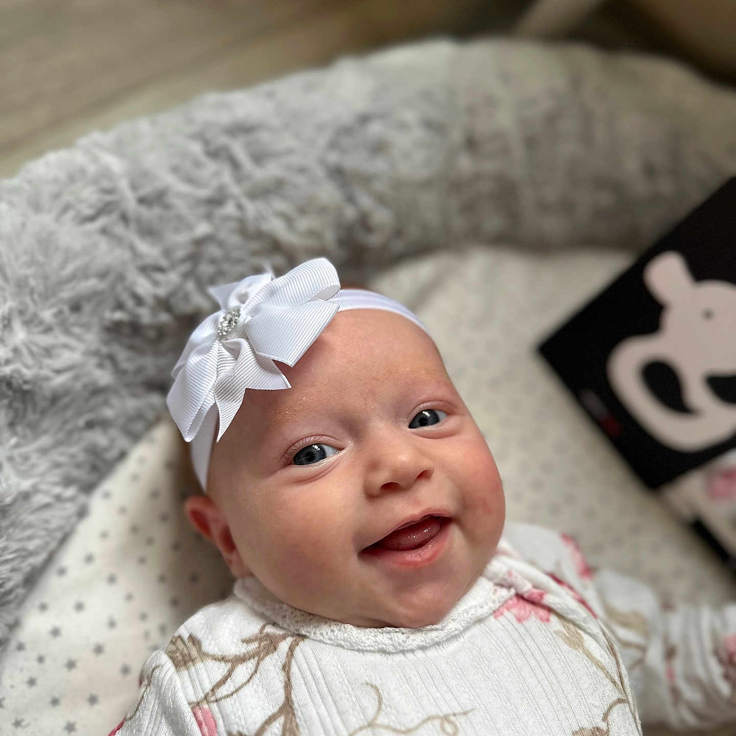 Ayla joined the competition — help win amazing prizes! accessories, baby, babylaughing, bed, clothing, couch, cushion, face, furniture, happy, hat, head, headband, homedecor, laughing, newborn, person, photography, portrait, smile