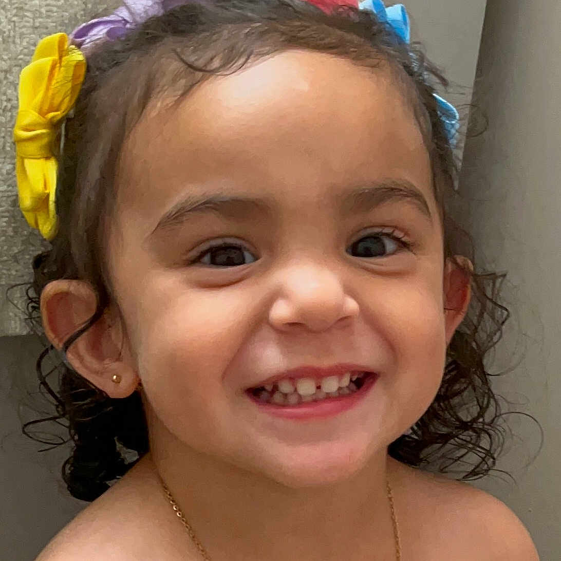 Alma joined the competition — help win amazing prizes! bows, child, childhood, closeup, colorful, curly_hair, cute, earrings, expression, face, happy, indoor, jewelry, joyful, necklace, person, portrait, skin, smiling, young