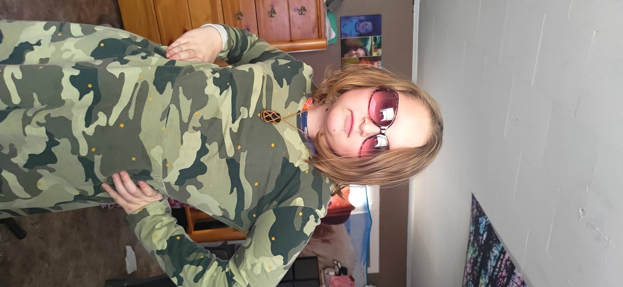 Mia joined the competition — help win amazing prizes! army, camouflage, child, comfort, eye, fun, gesture, military, military_camouflage, military_organization, military_person, military_uniform, non_commissioned_officer, pattern, person, picture_frame, room, smile, soldier, toddler