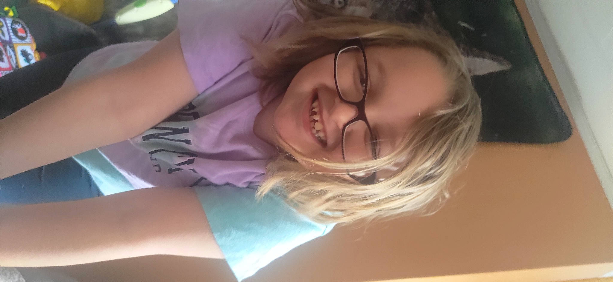 Mia is registered to the contest to win money with this photo: black_hair, cheek, chin, comfort, elbow, eyebrow, eyelash, eyewear, fun, happy, jaw, joy, lip, long_hair, mouth, neck, nose, person, shoulder, skin