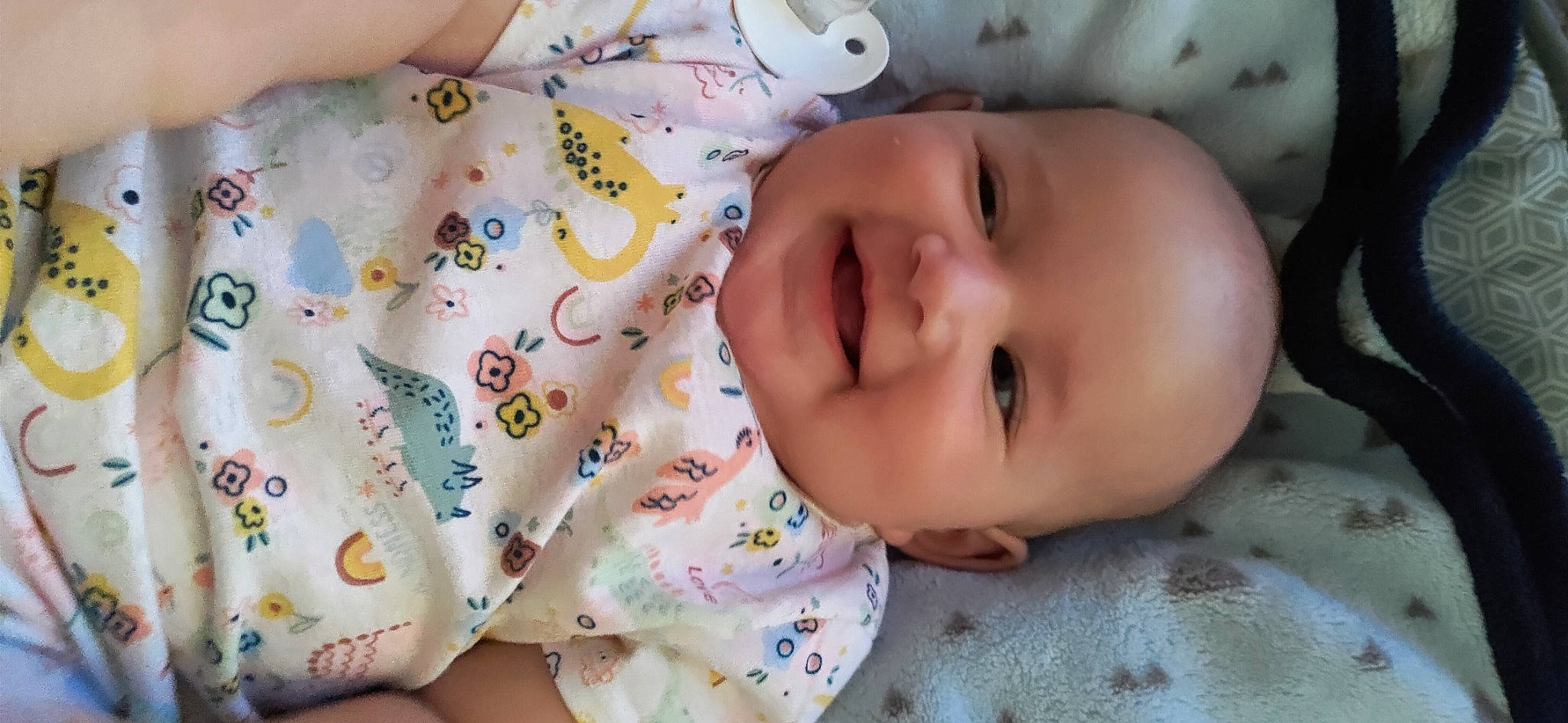 Sweet Pea joined the competition — help win amazing prizes! baby, baby_products, baby_toddler_clothing, cheek, child, comfort, finger, hand, happy, joy, linens, lip, nose, pattern, person, skin, sleeve, smile, textile, toddler