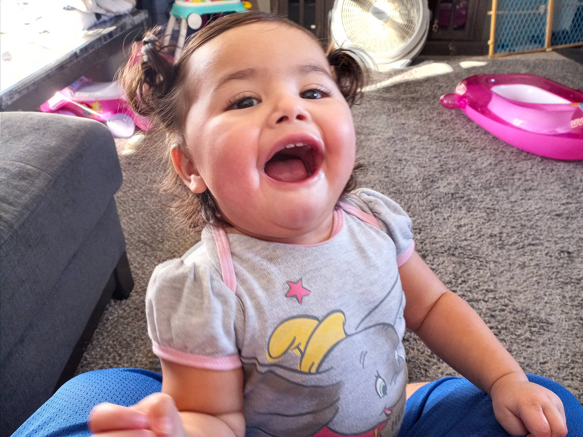 Koriee is registered to the contest to win money with this photo: baby, baby_toddler_clothing, cheek, child, event, fun, grass, happy, head, iris, leisure, mouth, nose, person, pink, public_space, sitting, skin, smile, summer