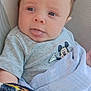Isiah joined the competition — help win amazing prizes! baby, infant, child, tongue_out, mickey_mouse, shirt, blanket, cozy, cute, face, expression, blue_eyes, hair, sitting, texture, closeup, portrait, soft, indoors, comfortable