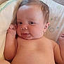 Isiah joined the competition — help win amazing prizes! baby, infant, diaper, cute, face, skin, lying_down, cushion, comfort, indoors, child, newborn, expression, head, arm, hand, legs, soft, relaxed, portrait