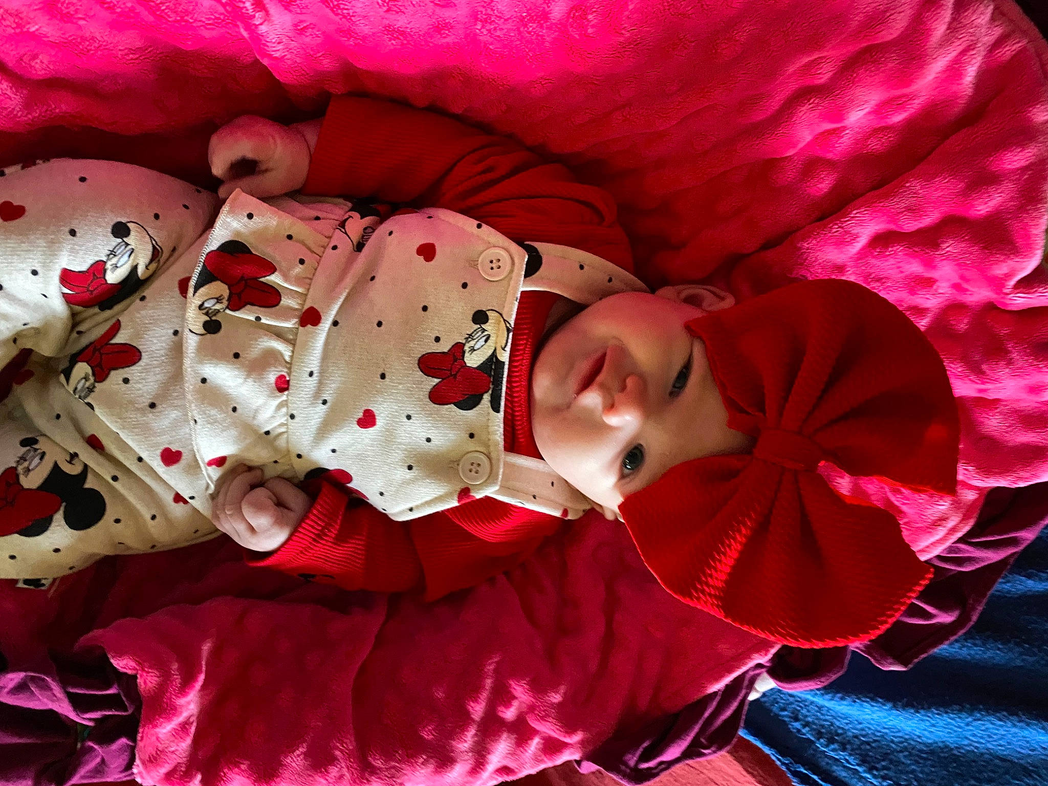 Lillie Jade joined the competition — help win amazing prizes! baby, baby_products, baby_toddler_clothing, carmine, child, costume_hat, event, fictional_character, happy, hat, headwear, lap, linens, magenta, person, petal, pink, red, room, sleeve