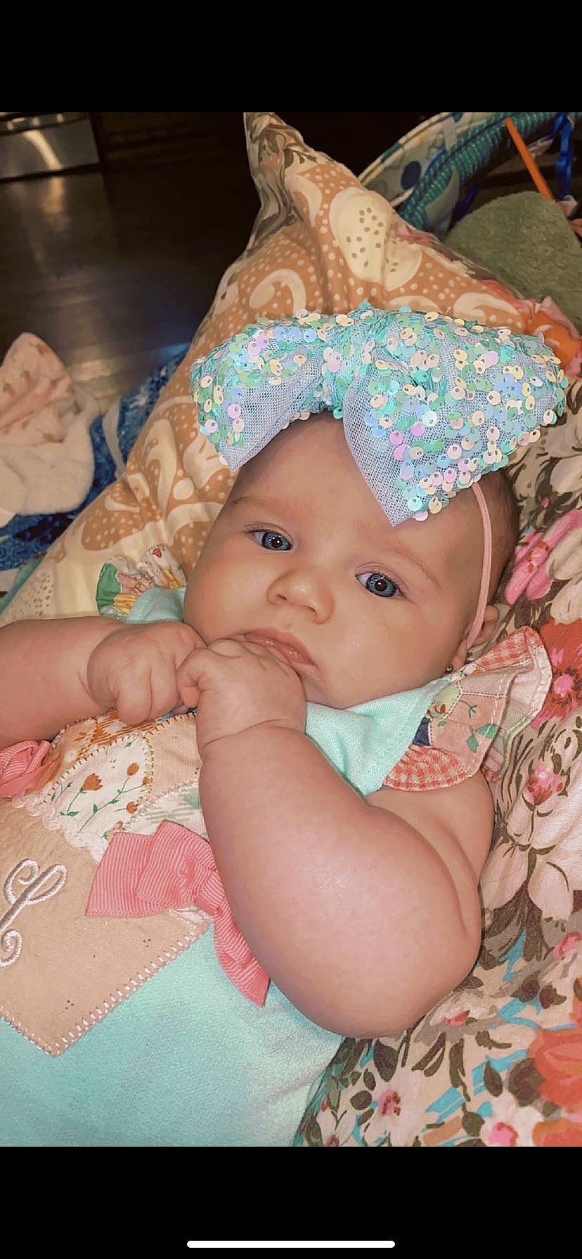 Lillie Jade is registered to the contest to win money with this photo: baby, baby_products, baby_toddler_clothing, cap, cheek, child, eye, fun, happy, head, headwear, human_body, iris, lip, mouth, nose, pattern, person, pink, skin