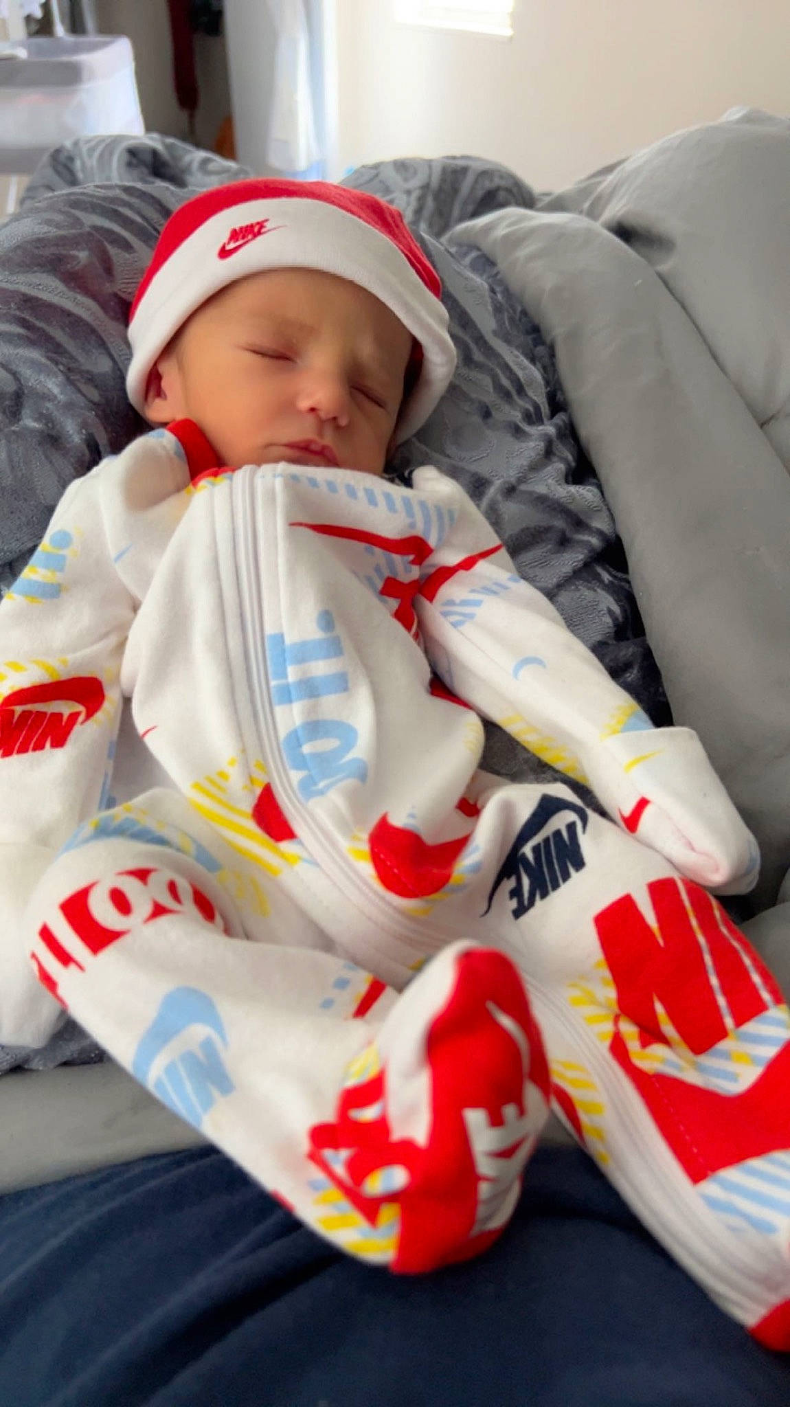 Kyson joined the competition — help win amazing prizes! baby, baby_products, baby_toddler_clothing, cap, carmine, child, comfort, costume, event, head, headwear, linens, person, sitting, sleeve, toddler, uniform, white