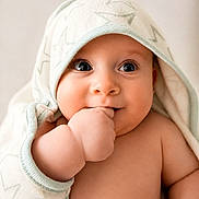 Zeppelin joined the competition — help win amazing prizes! baby, infant, cute, face, hand, blanket, wrapped, skin, expression, eyes, adorable, soft, cozy, child, newborn, portrait, cheeks, sleeve, warm, looking