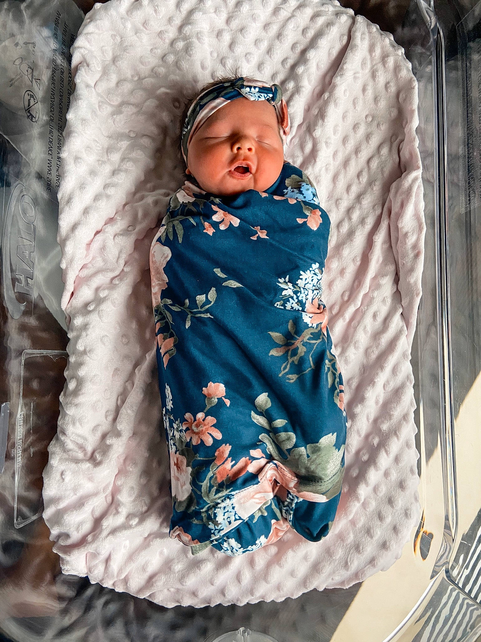 Brylee is registered to the contest to win money with this photo: baby, baby_toddler_clothing, child, comfort, electric_blue, event, face, fashion_accessory, freezing, fur, headwear, linens, magenta, pattern, person, portrait_photography, room, sitting, sleeve, textile