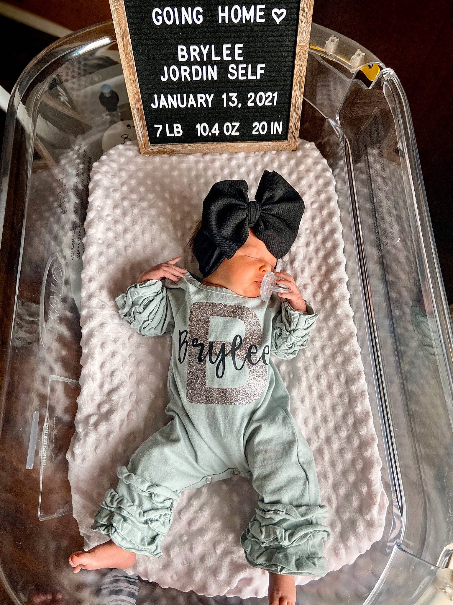 Brylee is registered to the contest to win money with this photo: advertising, baby_toddler_clothing, comfort, fashion_accessory, fashion_design, flesh, font, hat, linens, metal, pattern, product, rectangle, sleeve, white