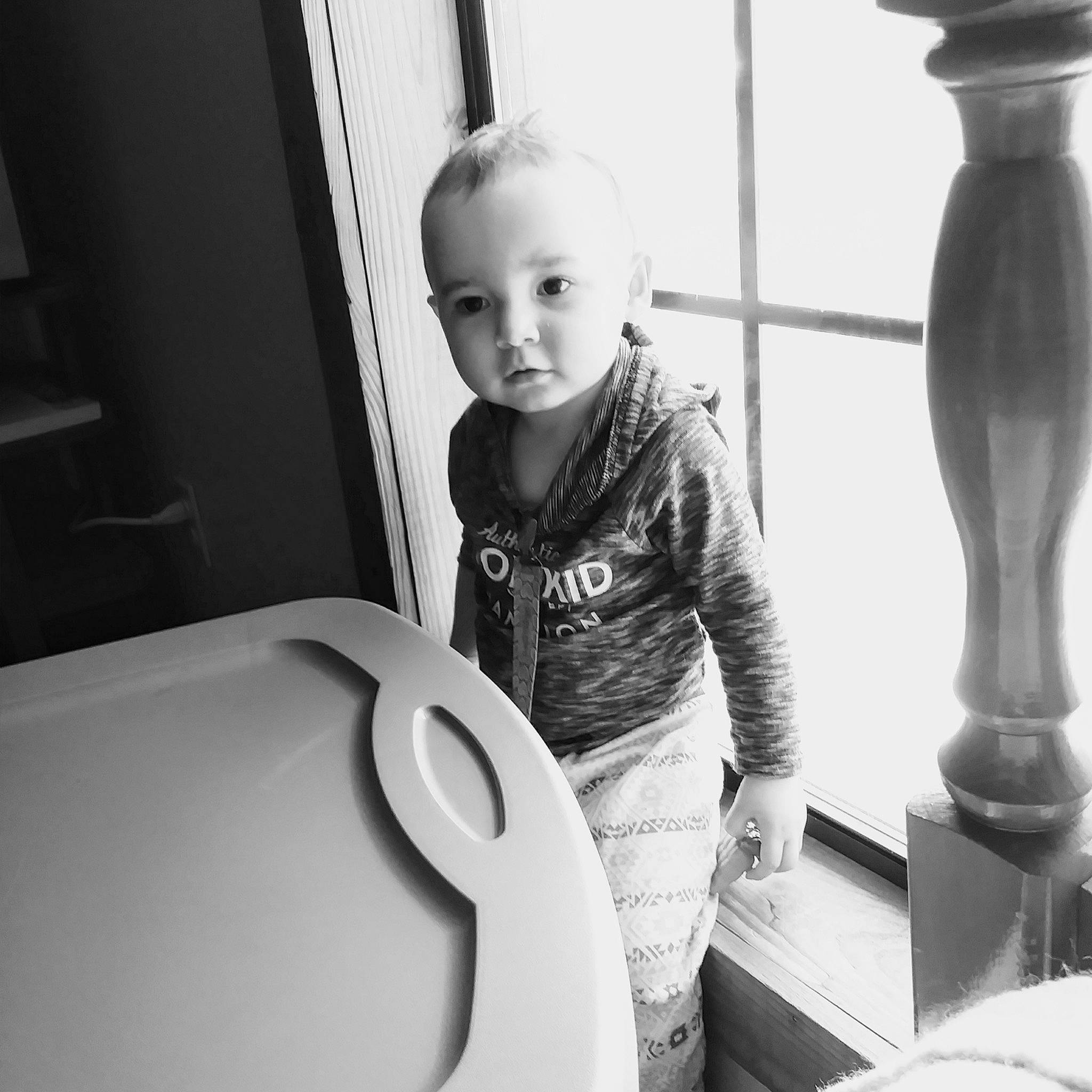 Pyper is registered to the contest to win money with this photo: black, black_and_white, child, monochrome, monochrome_photography, person, photograph, photography, play, plumbing_fixture, smile, snapshot, standing, style, toddler, white