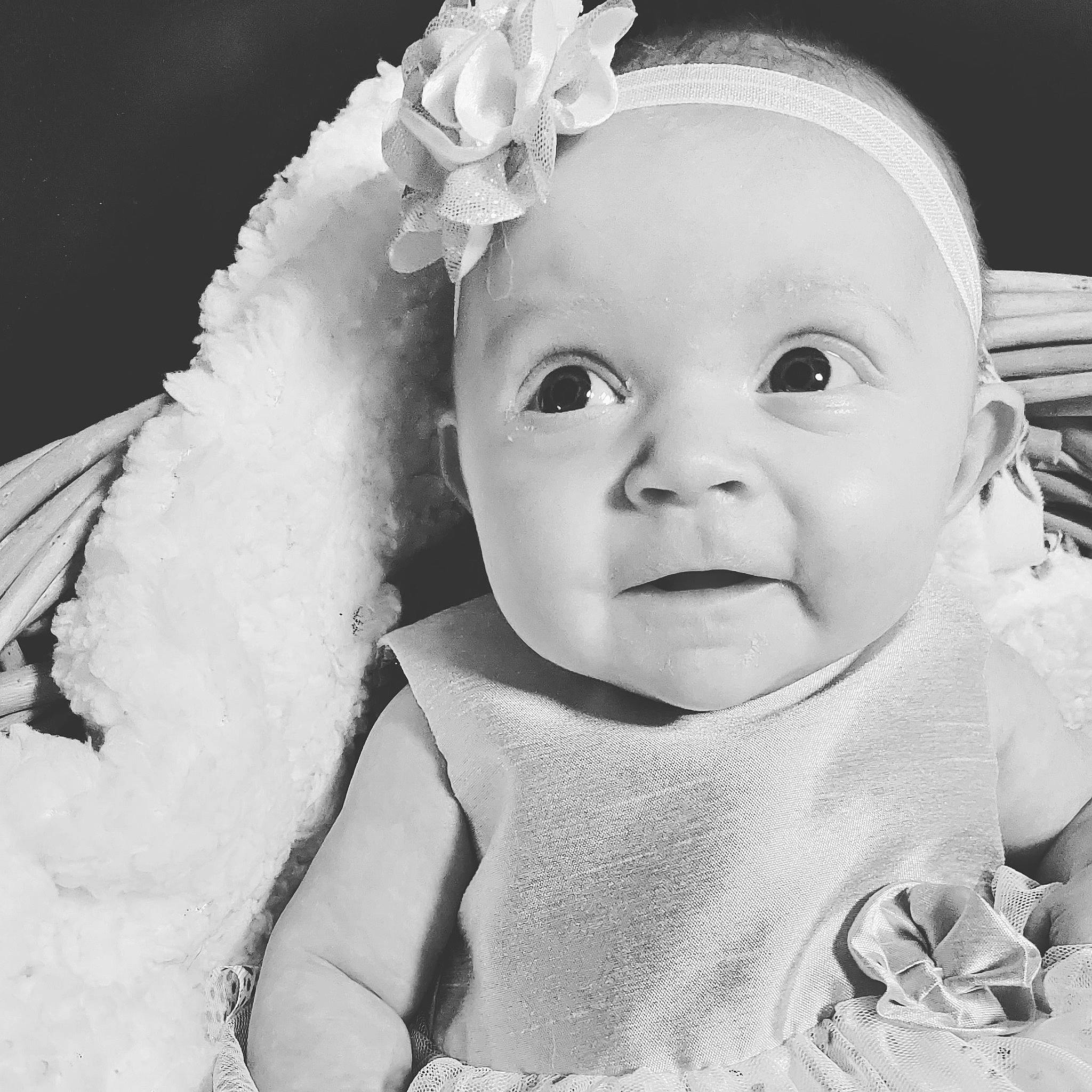 Chloe is registered to the contest to win money with this photo: arm, baby, baby_toddler_clothing, cheek, chin, eye, eyebrow, face, hairstyle, happy, head, iris, lip, mouth, nose, person, product, skin, sleeve, textile