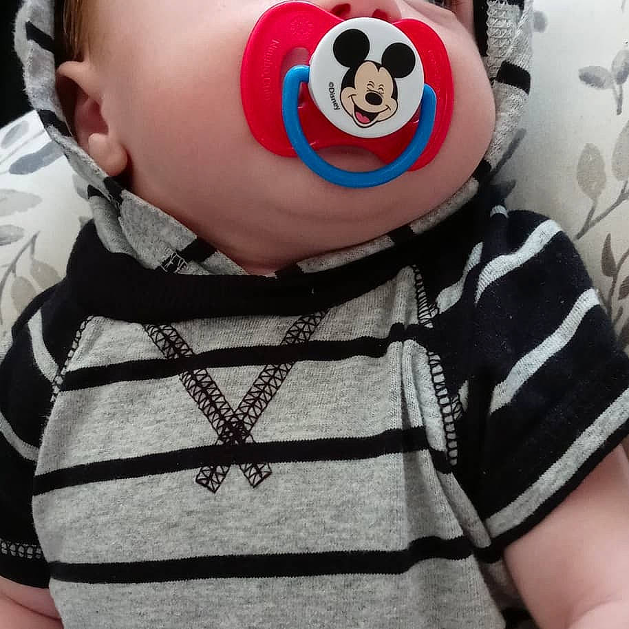 Jason Jr is registered to the contest to win money with this photo: baby_toddler_clothing, bear, black, carmine, font, fur, happy, linens, panda, pattern, person, personal_protective_equipment, pink, plush, selfie, sleeve, stuffed_toy, t_shirt, teddy_bear, toy