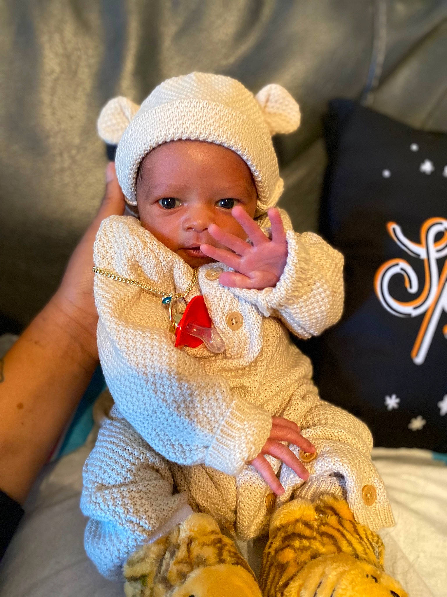 Amir joined the competition — help win amazing prizes! baby, baby_products, baby_toddler_clothing, cap, cheek, child, comfort, eye, face, fashion_accessory, happy, knit_cap, linens, pattern, person, sitting, skin, sleeve, textile, toddler
