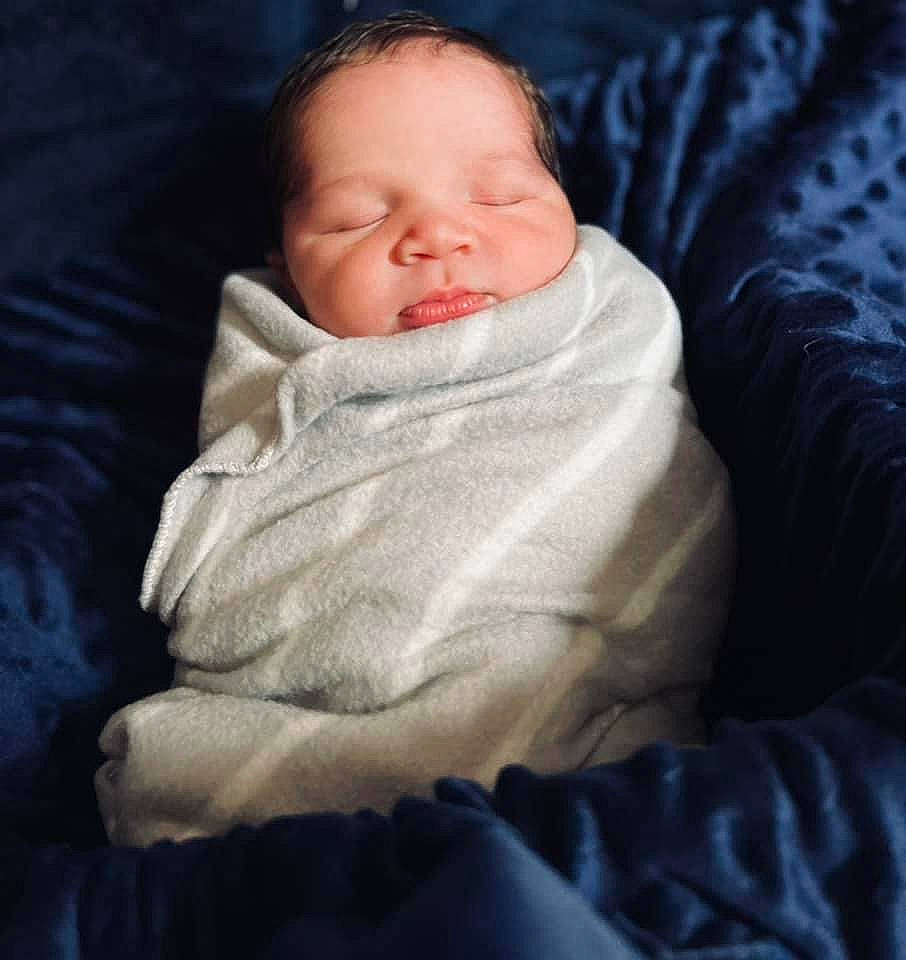 Kaysen is registered to the contest to win money with this photo: baby, baby_sleeping, baby_toddler_clothing, bedding, bedtime, blanket, cheek, child, comfort, fur, linens, nap, nose, person, portrait_photography, room, sitting, sleep, sleeve, textile