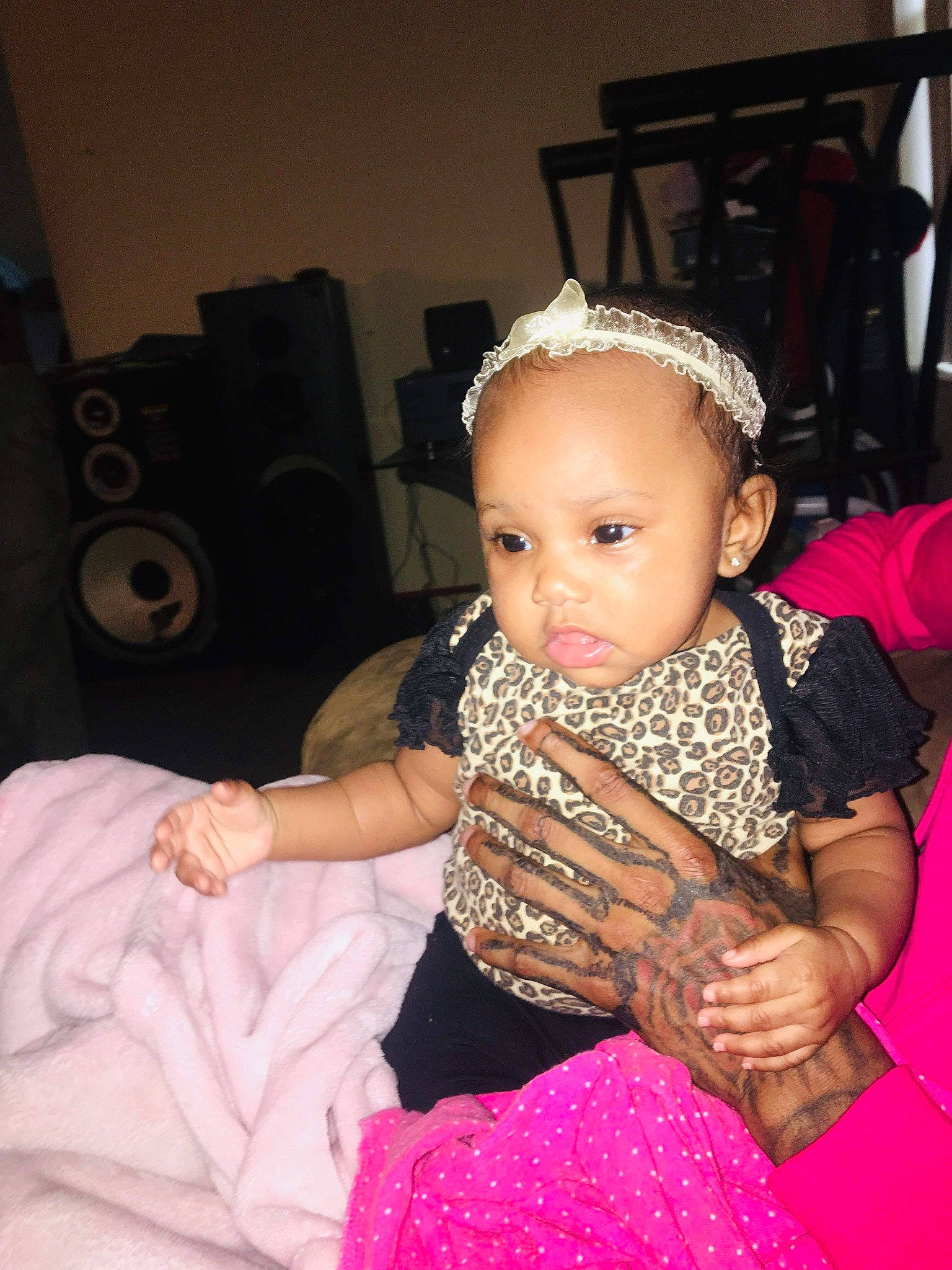 Laylay is registered to the contest to win money with this photo: baby, cheek, child, daughter, design, fashion_accessory, finger, hair_accessory, hand, headband, headgear, pattern, person, pink, sitting, skin, toddler