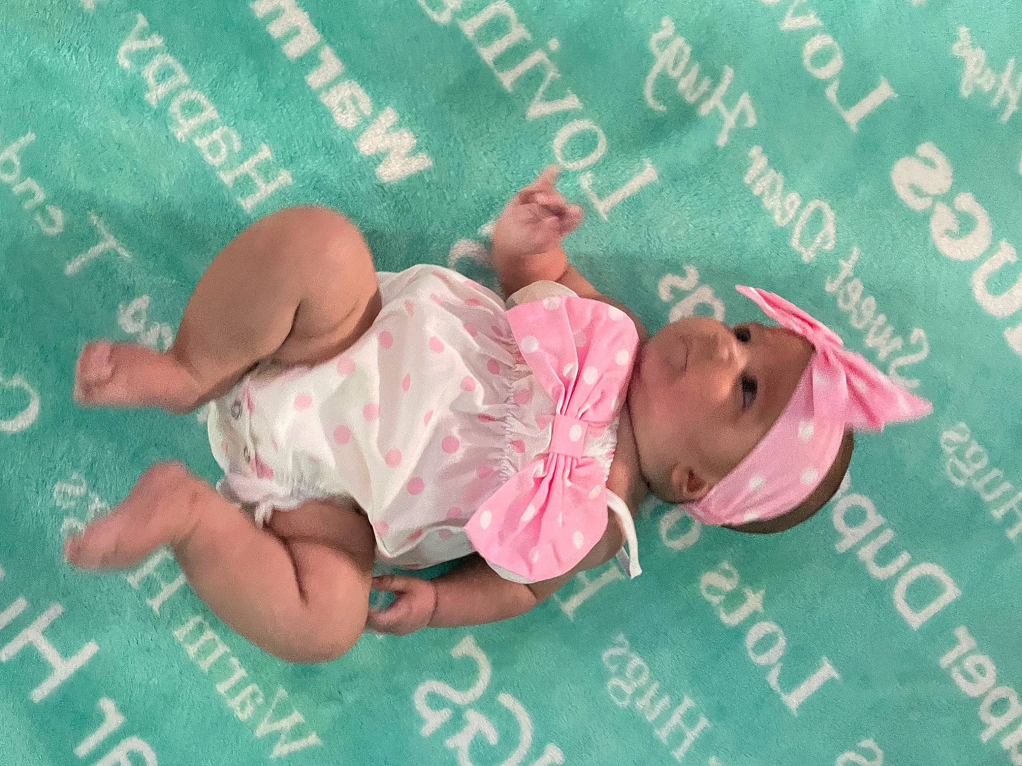 Ariah is registered to the contest to win money with this photo: baby, baby_toddler_clothing, chalk, cheek, child, comfort, font, fun, grass, handwriting, happy, headwear, jewellery, leisure, linens, magenta, pattern, person, pink, room