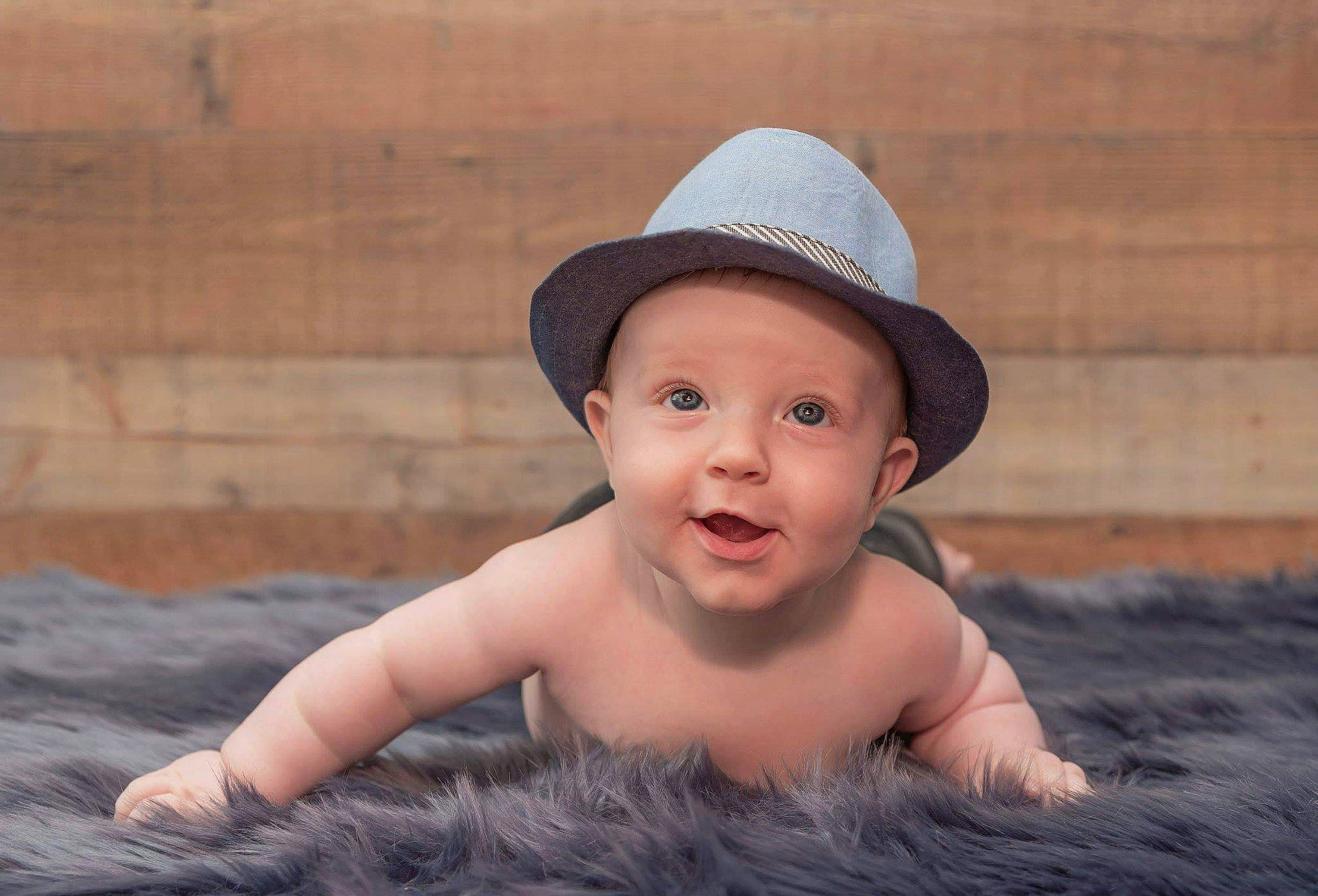 Keegan is registered to the contest to win money with this photo: baby, cap, child, child_model, clothing, costume_accessory, fashion_accessory, fun, hat, headgear, person, photograph, photography, portrait, portrait_photography, skin, smile, sun_hat, toddler, vacation