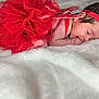 Shaniyah Avangelina joined the competition — help win amazing prizes! baby, newborn, tutu, red, headband, flower, blanket, sleeping, infant, cute, child, soft, peaceful, portrait, lying_down, hand, skin, indoors, closeup, adorable
