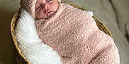 Shaniyah Avangelina joined the competition — help win amazing prizes! baby, basket, blanket, cozy, cute, face, hat, infant, indoors, laying, pink, portrait, resting, sleepy, soft, swaddled, toddler, warm, woven, young_child