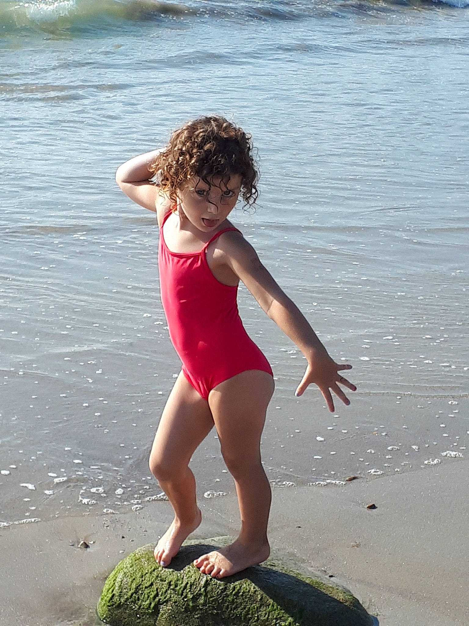 Sarah participe au concours pour gagner de l'argent avec cette photo : barefoot, beach, child, coast, fun, happy, leg, leotard, person, photography, play, sand, sea, sportswear, summer, toddler, vacation, water