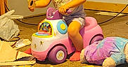 Brynlee is registered to the contest to win money with this photo: accessories, boy, child, clothing, face, footwear, glasses, head, helmet, machine, male, person, photography, portrait, shoe, shorts, sitting, sunglasses, t_shirt, wheel