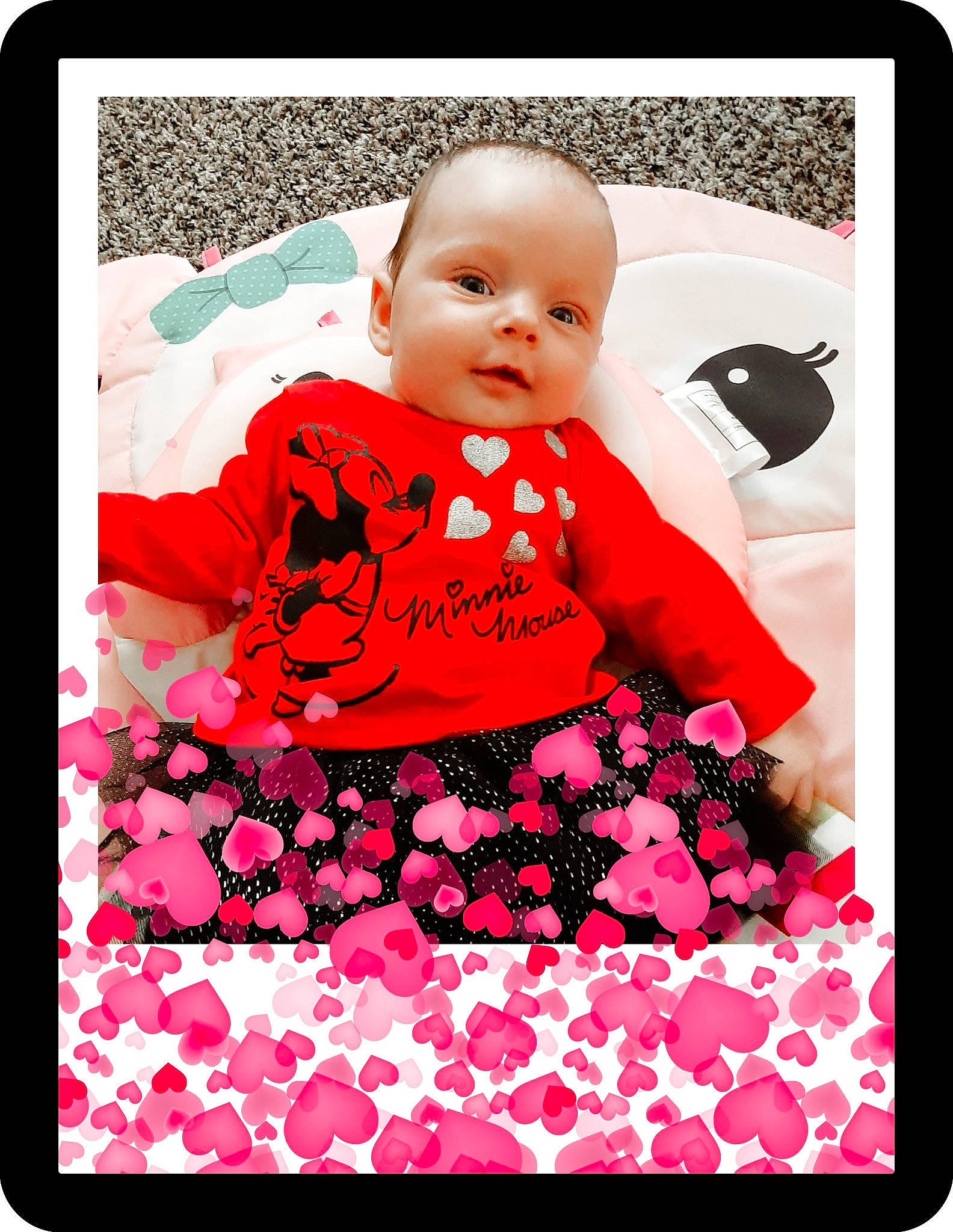 Malorie is registered to the contest to win money with this photo: baby, baby_products, child, magenta, person, petal, picture_frame, pink, product, textile, toddler