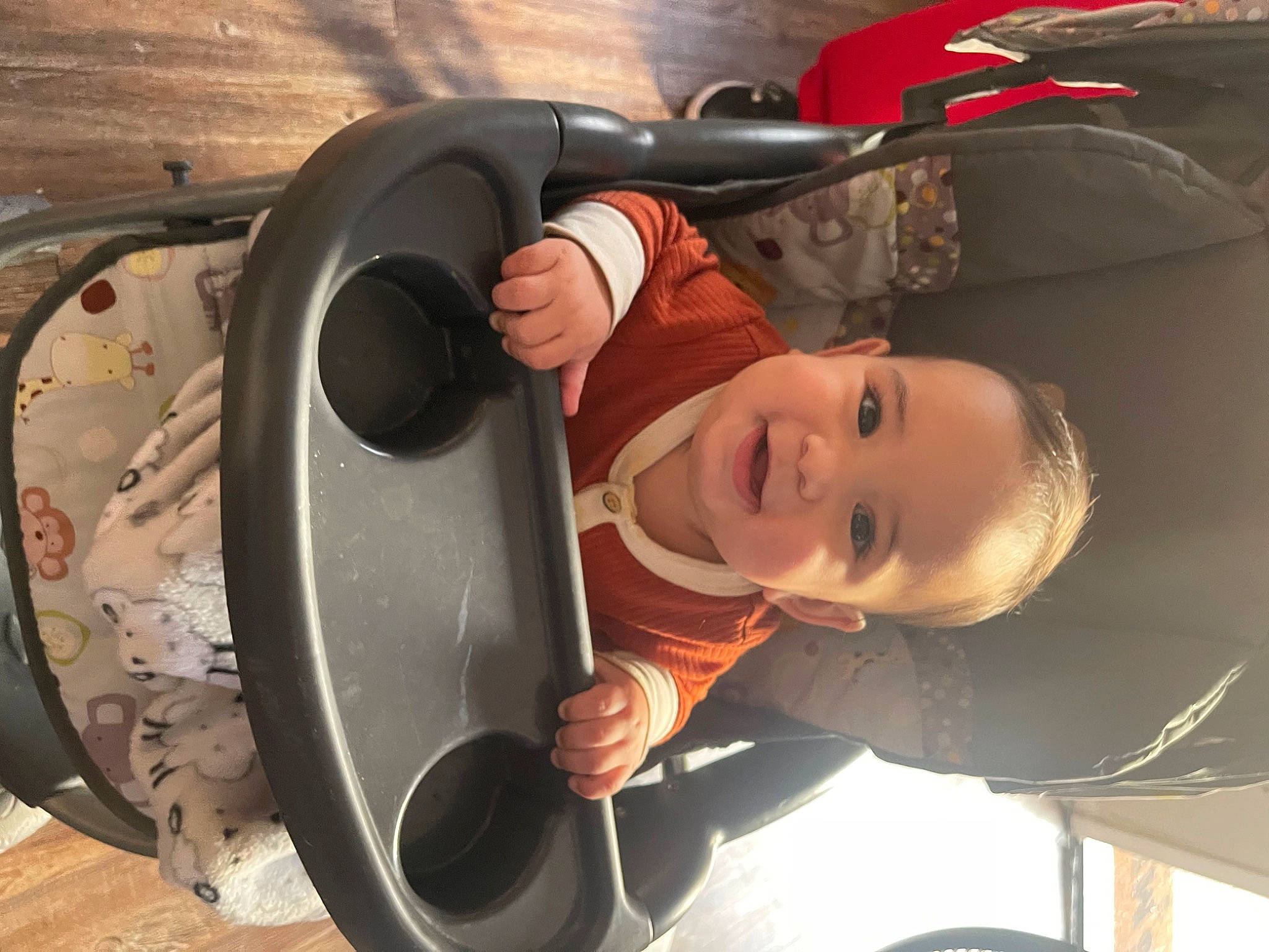 Taveien is registered to the contest to win money with this photo: alloy_wheel, auto_part, automotive_design, automotive_exterior, automotive_lighting, automotive_tire, automotive_wheel_system, bumper, fender, hat, joy, motor_vehicle, person, rim, smile, tire, toddler, tread, vehicle, vehicle_door