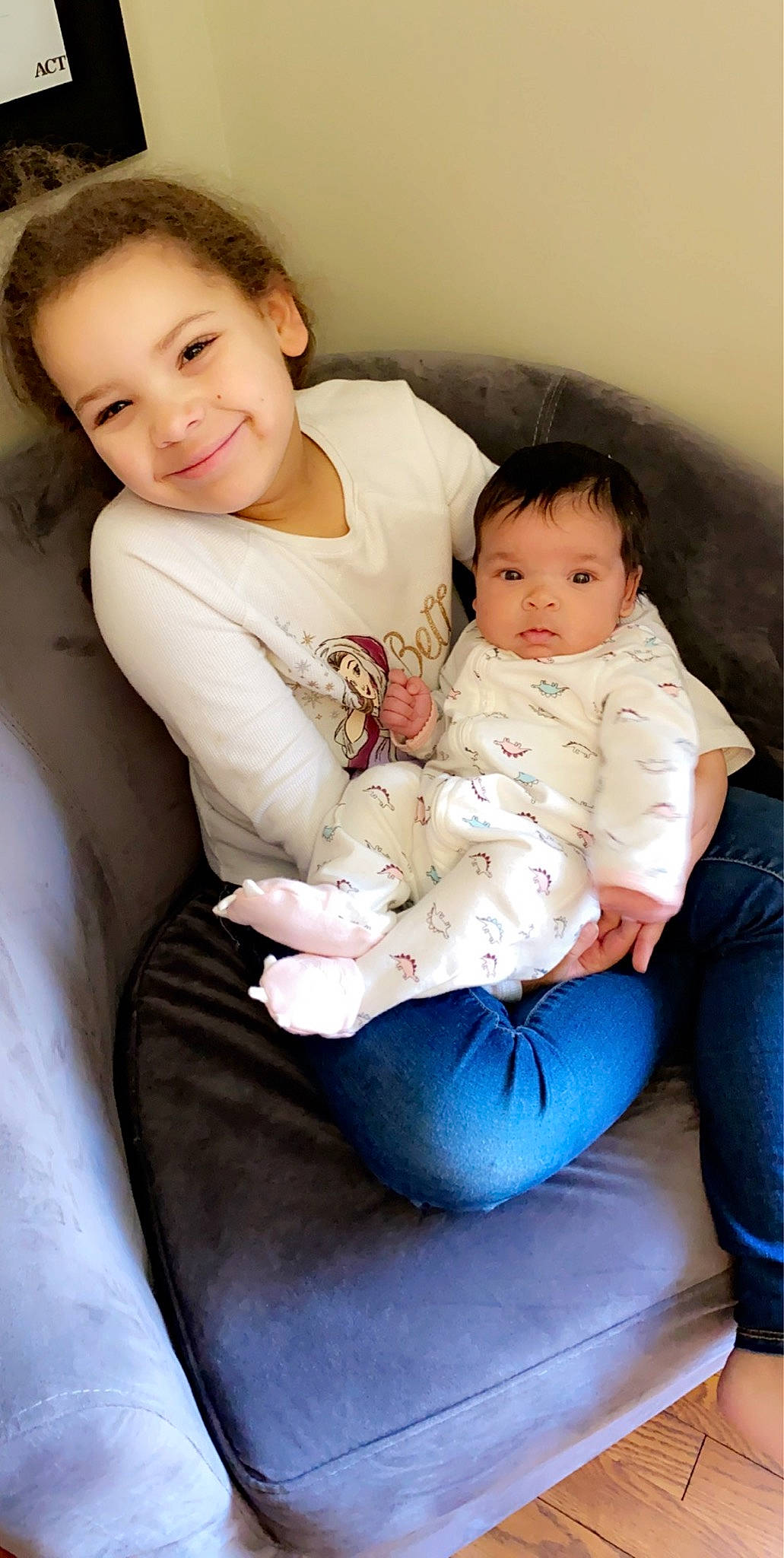 Chanel is registered to the contest to win money with this photo: baby, child, comfort, joy, person, sibling, sitting, skin, toddler