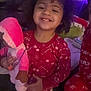 Melrose is registered to the contest to win money with this photo: baby, bodypart, child, clothing, face, female, girl, glove, happy, hat, head, inflatable, mouth, pajamas, person, photography, portrait, smile, teeth, toy