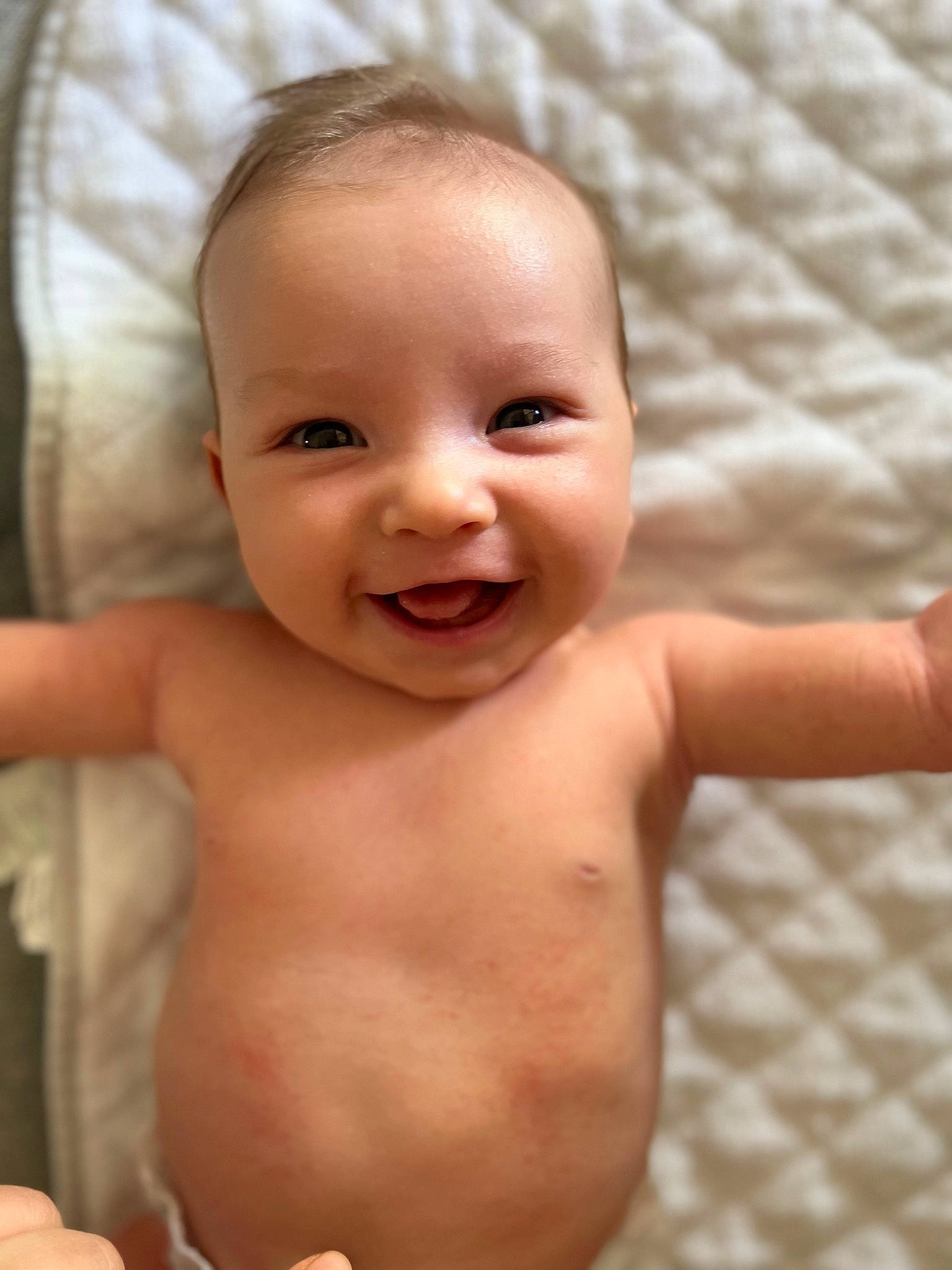 Owen is registered to the contest to win money with this photo: arm, baby, cheek, chin, eye, eyebrow, face, forehead, hairstyle, happy, head, human_body, iris, joy, lip, mouth, neck, nose, person, skin