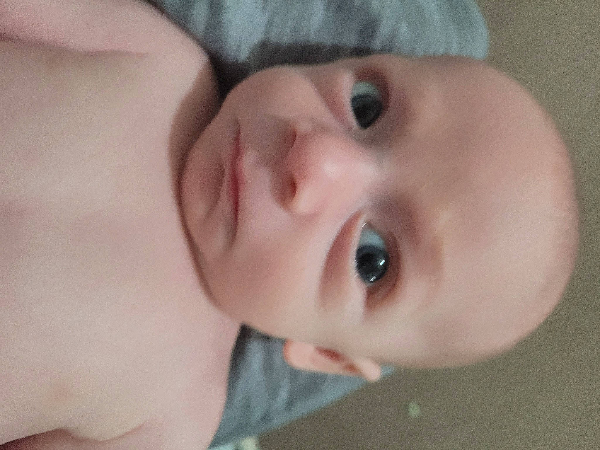 Scott is registered to the contest to win money with this photo: baby, cheek, eye, eyebrow, eyelash, flash_photography, forehead, gesture, happy, head, headgear, human_body, iris, lip, mouth, neck, nose, person, skin, smile