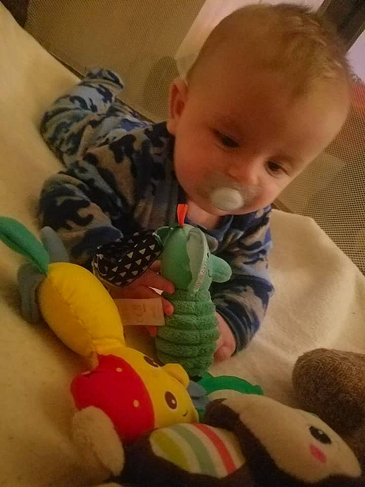 Slade is registered to the contest to win money with this photo: baby, baby_toys, cheek, child, person, play, skin, stuffed_toy, toddler, toy