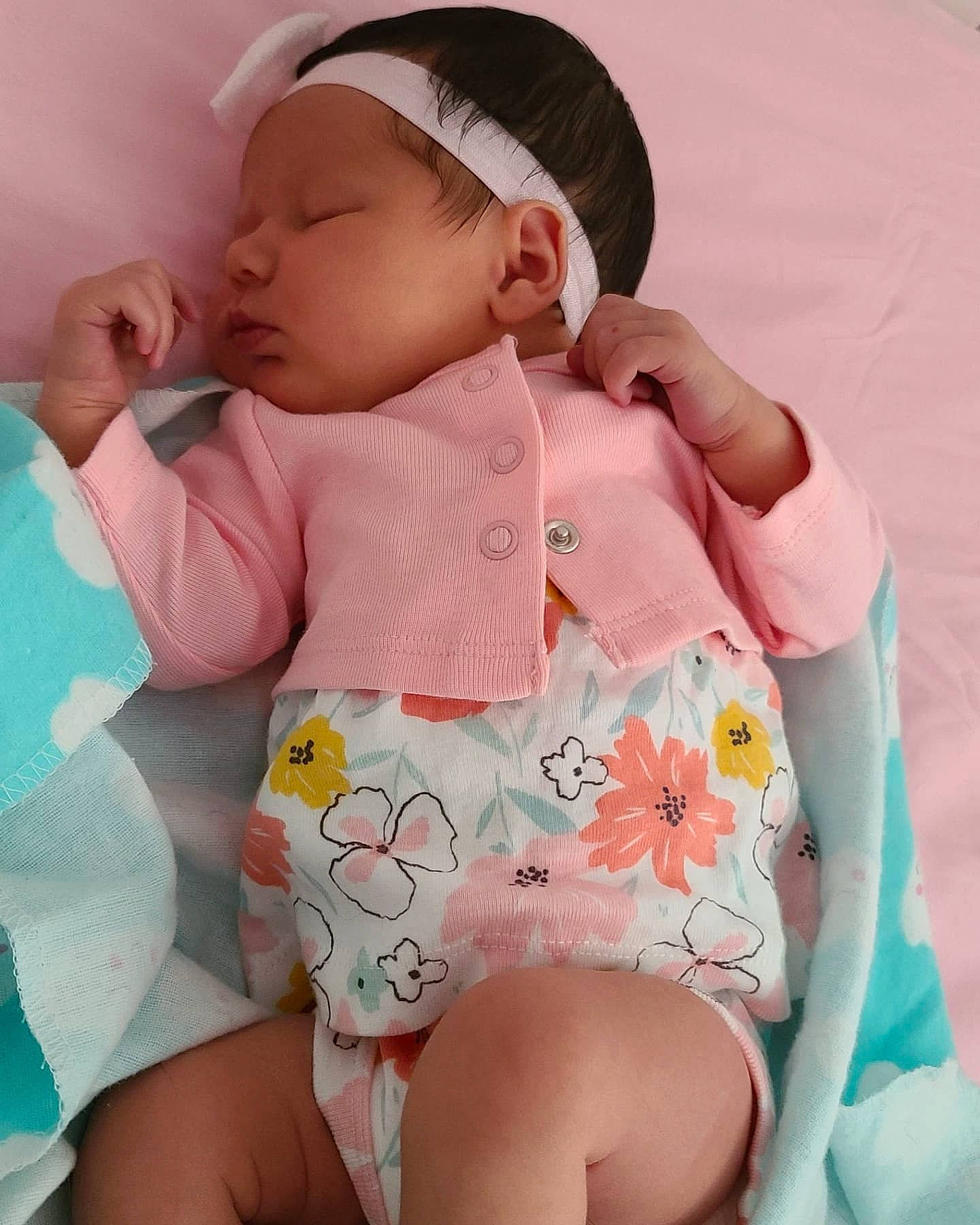 Sydney is registered to the contest to win money with this photo: arm, baby_sleeping, baby_toddler_clothing, cheek, chin, clothing, eye, face, hand, head, human_body, leg, lip, mouth, muscle, neck, person, skin, sleeve, stomach